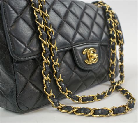 classic chanel black anf gold bag|Chanel bag black classic.